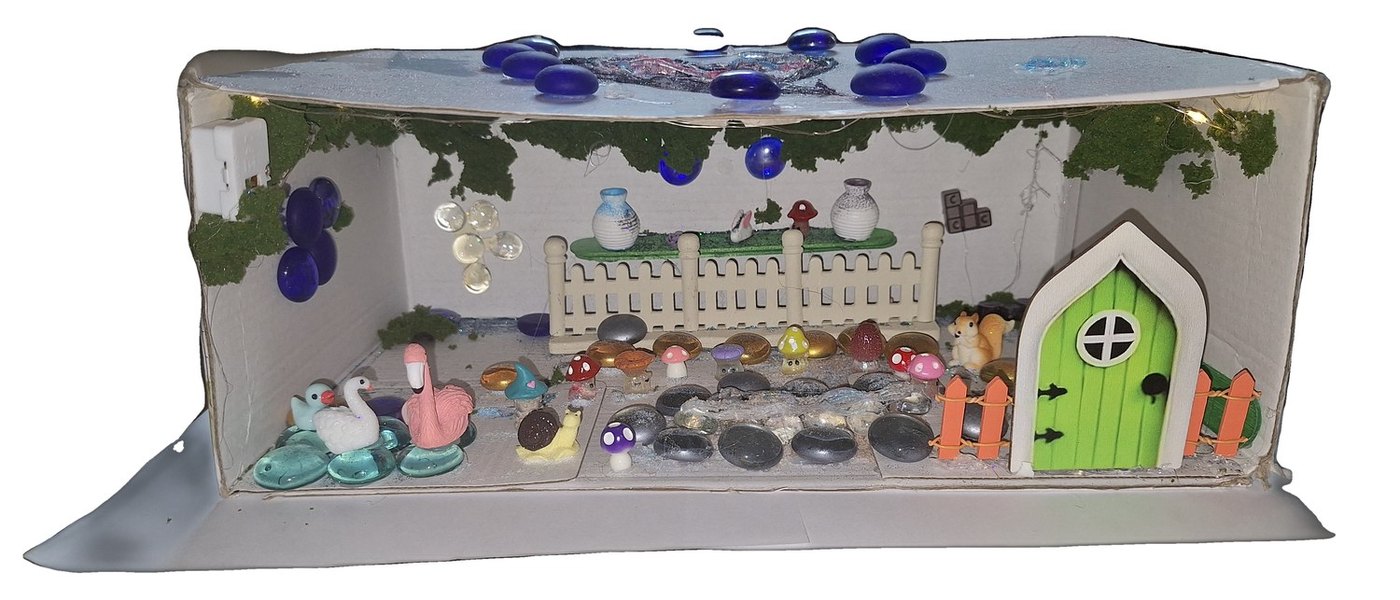 Lighted miniature fairy garden shadow-box scene